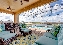 3213.tn-pool deck with covered lanai comfy seating overlooking pond.JPG